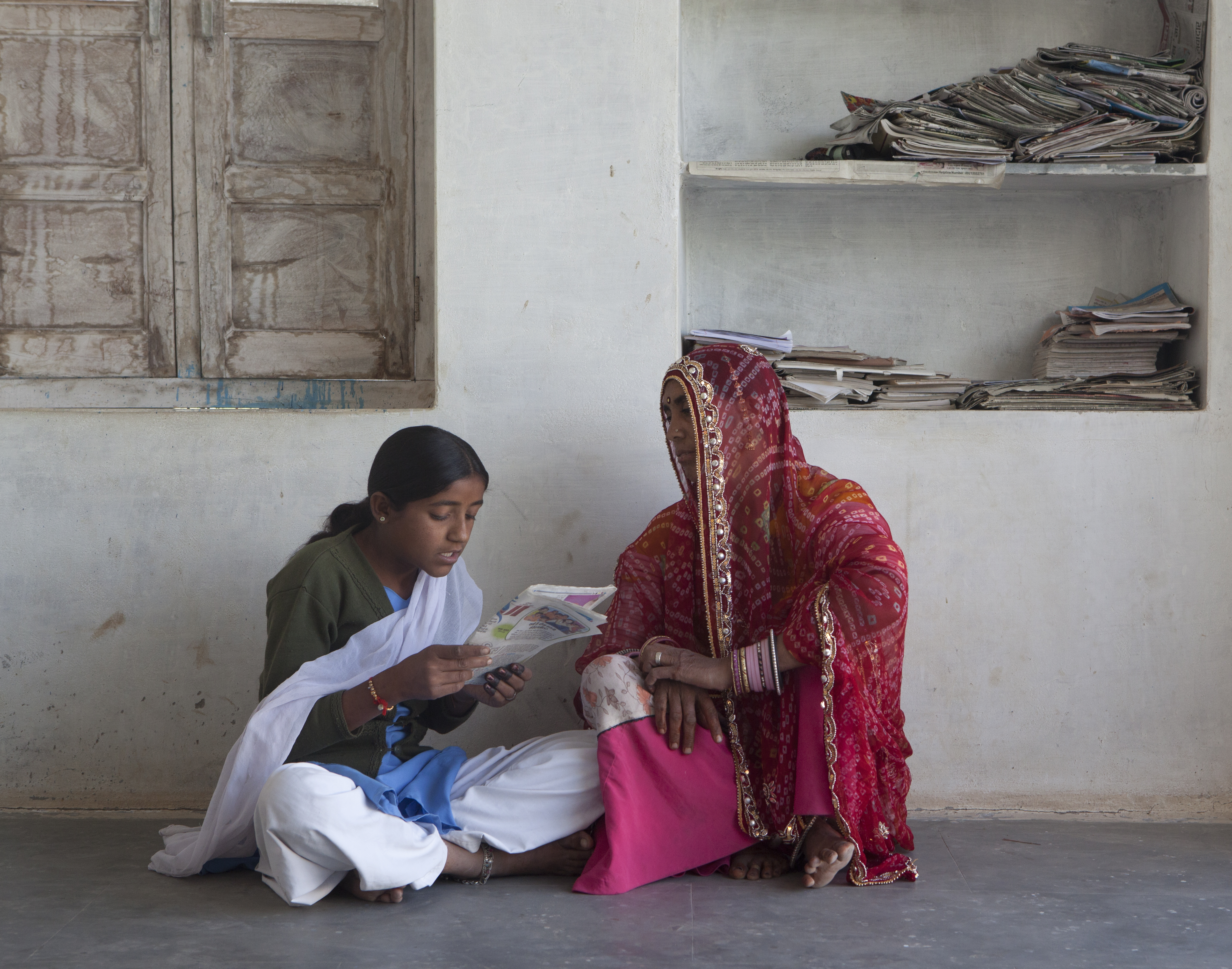 Chaddi reads to her mother by Mark Tuschman