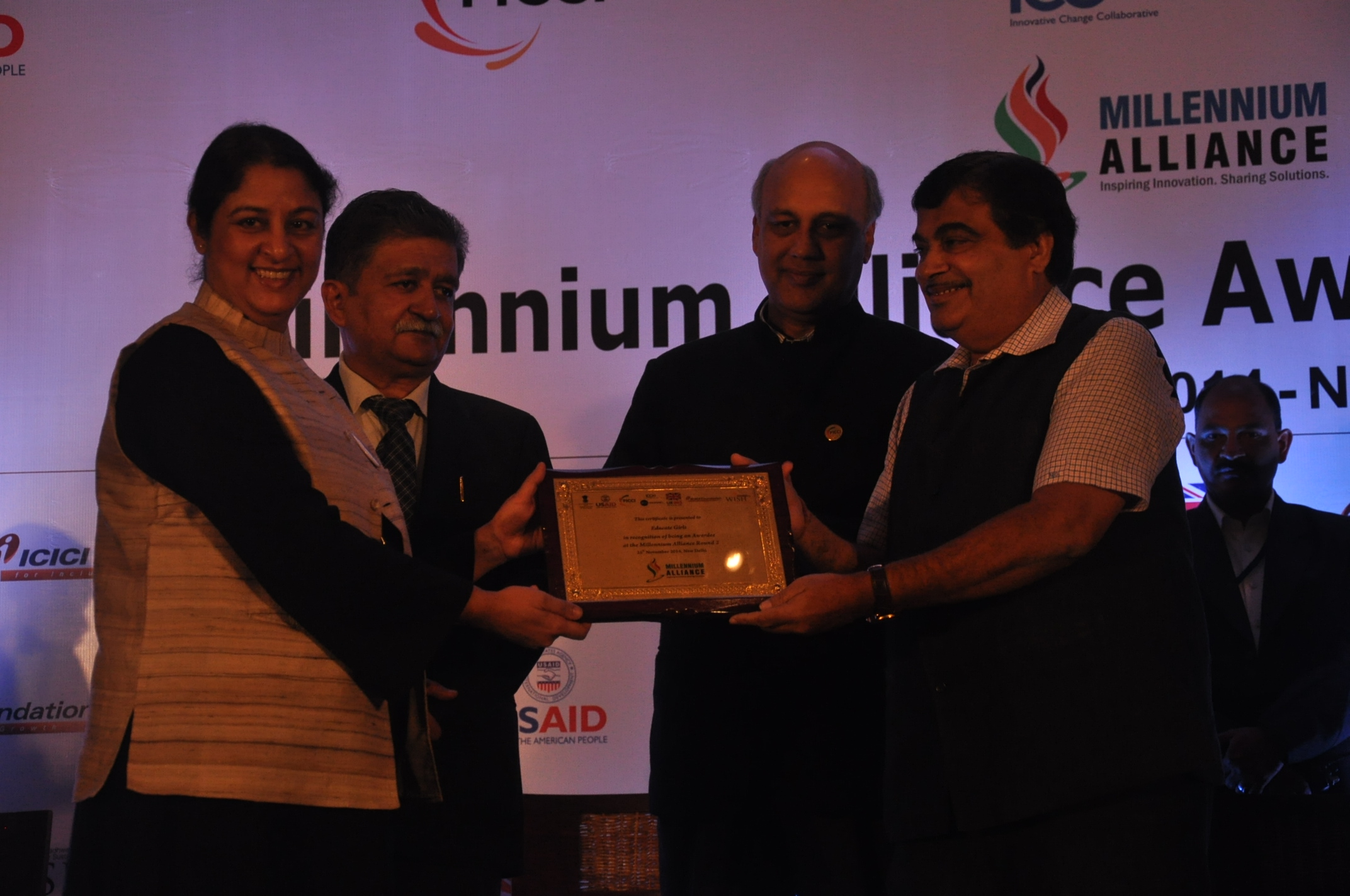 Safeena Husain, Executive Director & Founder of Educate Girls, receives the Millennium Alliance Award from Nitin Gadkari, Union Minister of the Ministry of Road Transport & Highways and Shipping, Govt. of India